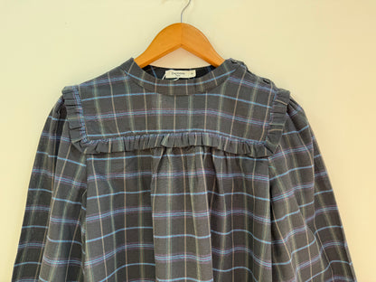 Blouse à carreaux et volants