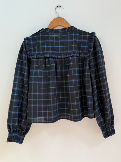 Blouse à carreaux et volants
