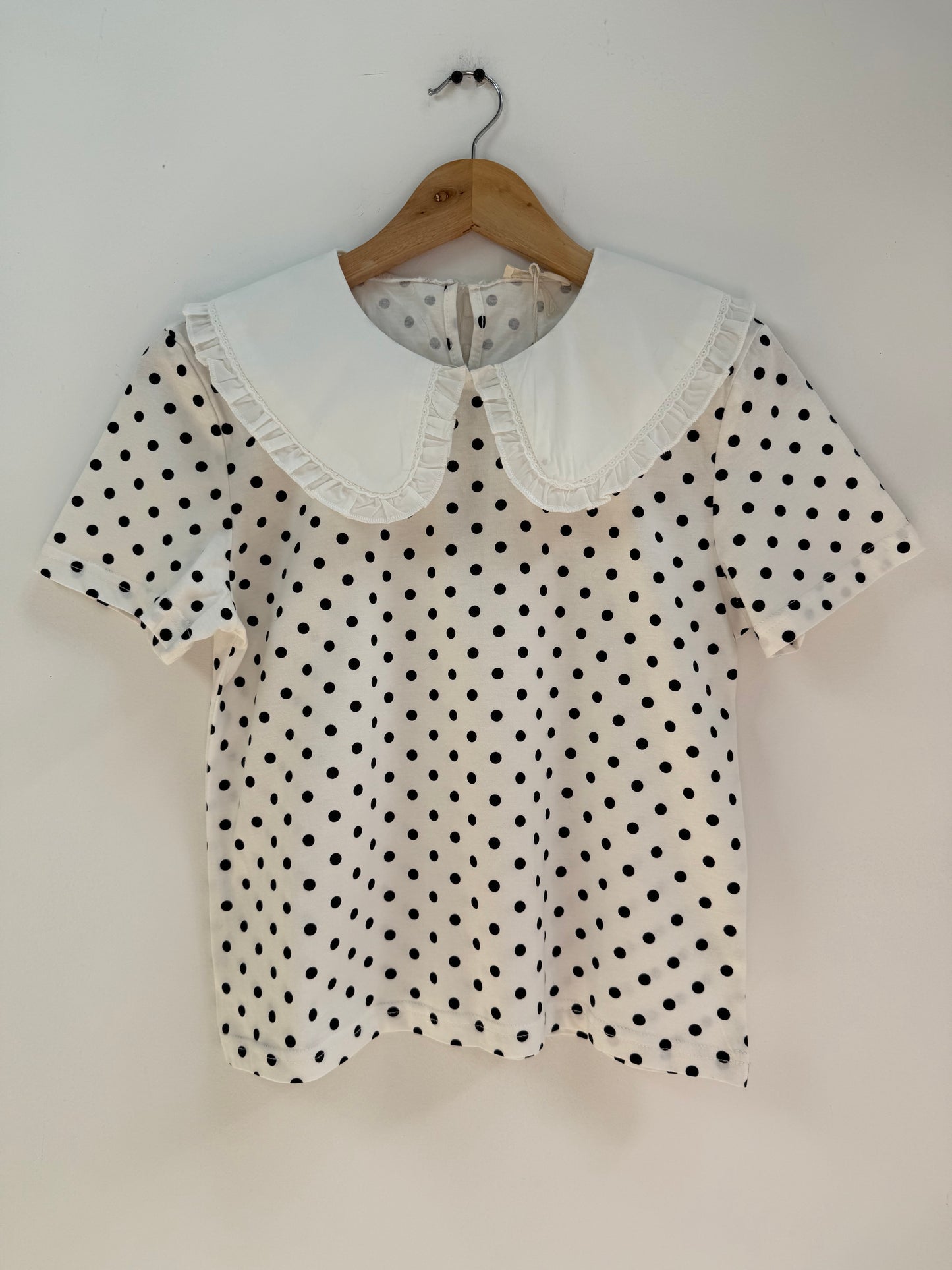T-shirt grand col manches courtes blanc à poids noirs