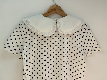 T-shirt grand col manches courtes blanc à poids noirs