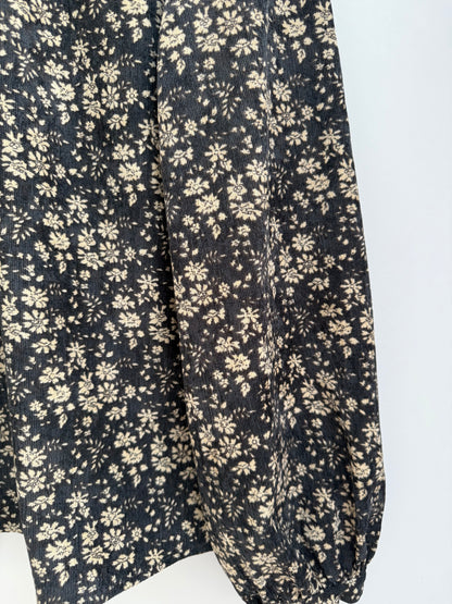Blouse en velours noire avec motifs crème