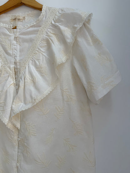 Chemise crème manches courtes avec volants et motifs