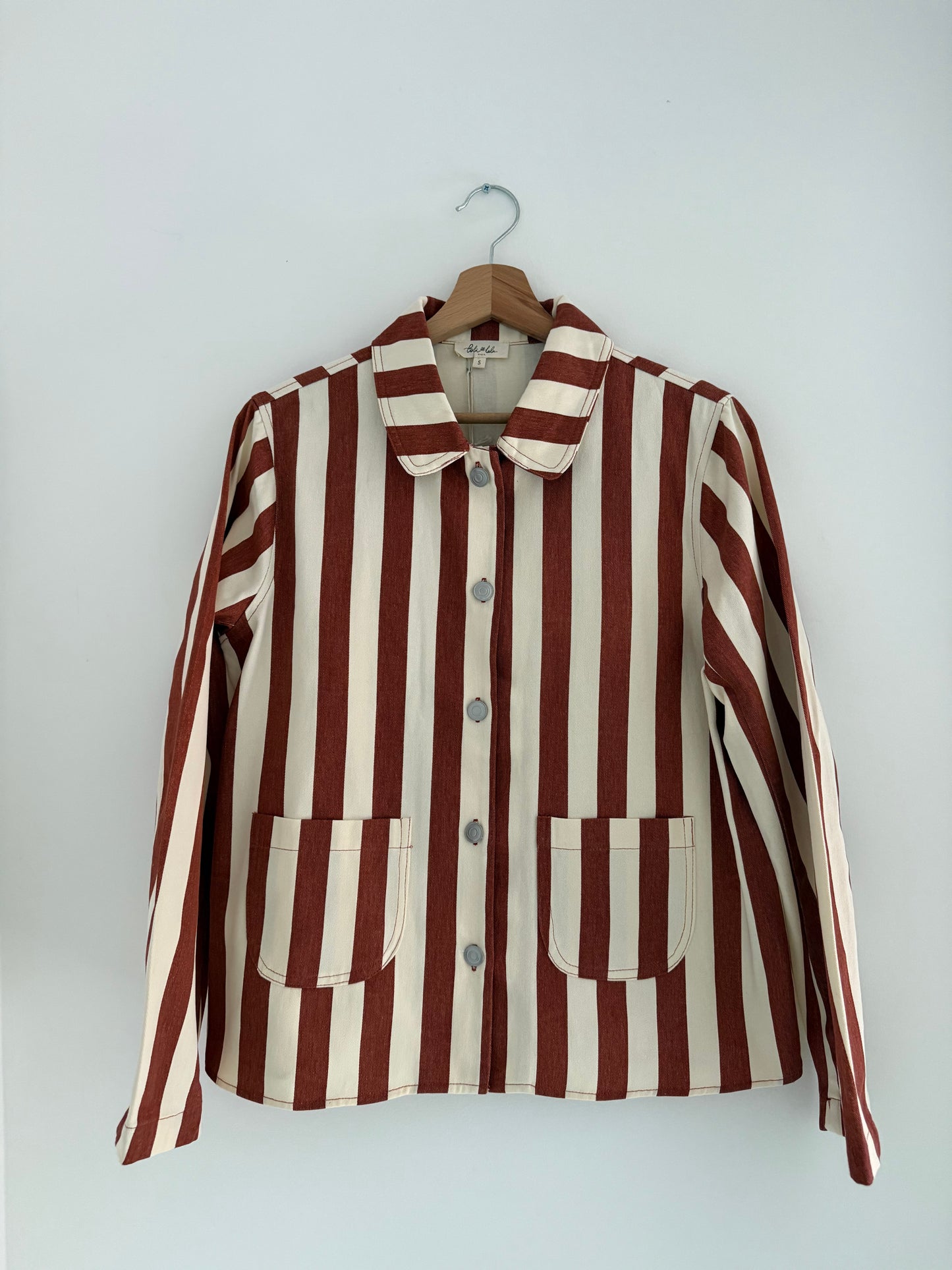 Veste avec col rayée rouille et crème