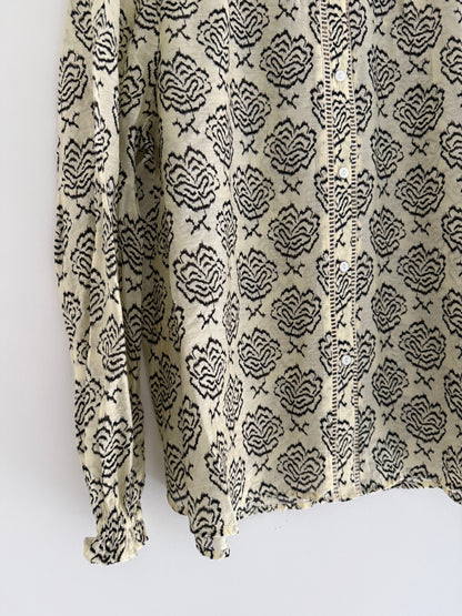 Blouse légère beige avec motifs noirs