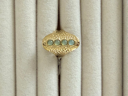 Bague fantaisie dorée martelée avec pierres grises