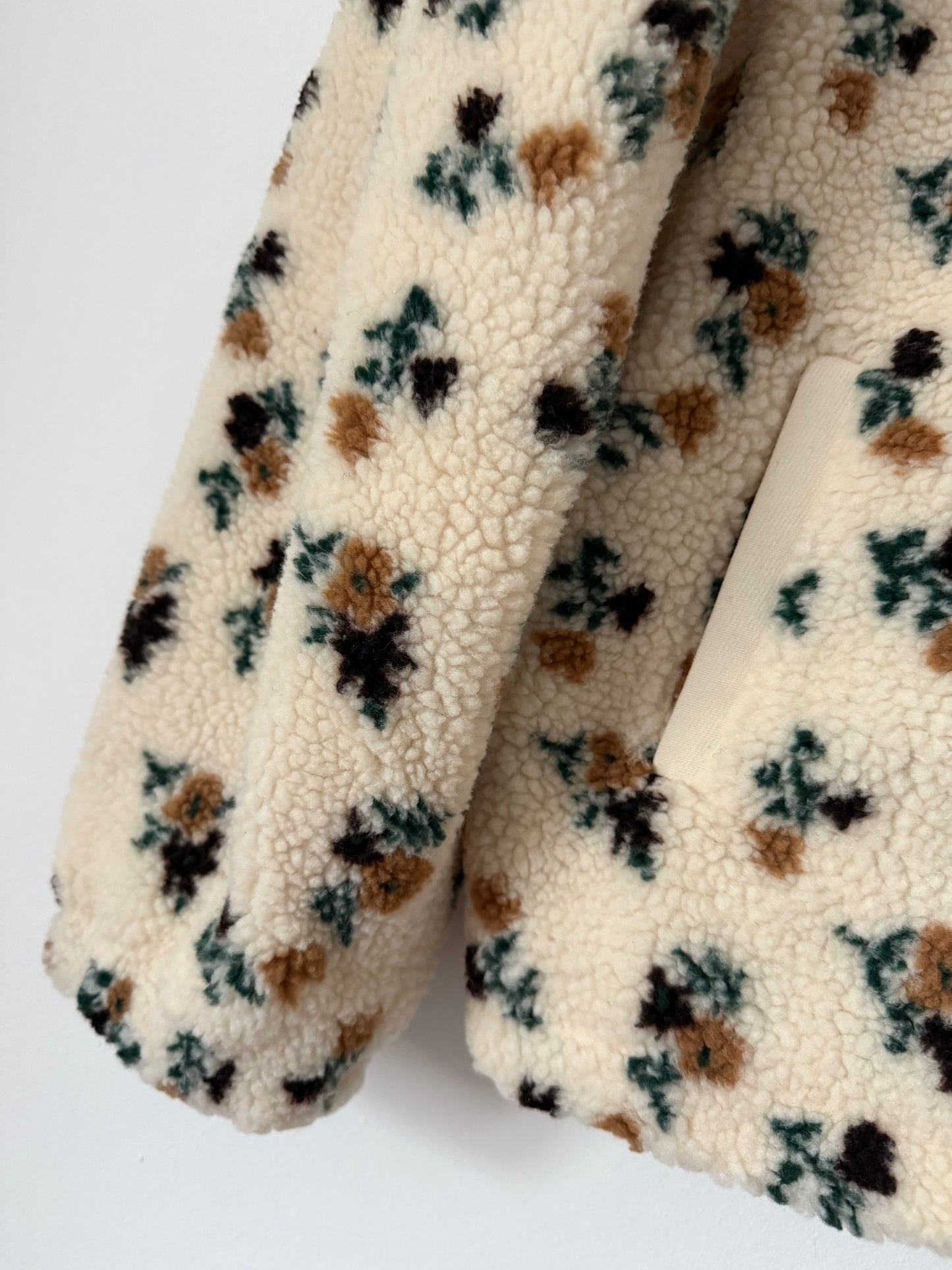 Veste polaire moumoute crème avec motifs