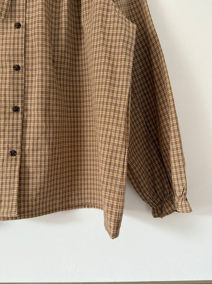 Blouse ample à carreaux col lavallière