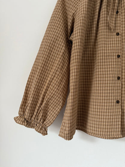 Blouse ample à carreaux col lavallière