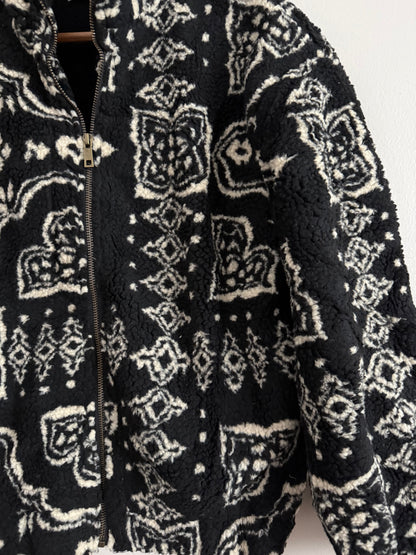 Veste polaire à bouclettes crème avec motifs beiges