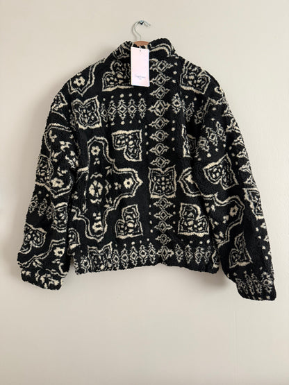 Veste polaire à bouclettes crème avec motifs beiges